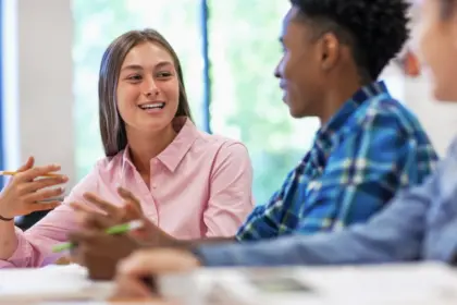 boy and teacher having a conversation 